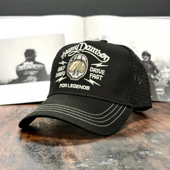 Trucker-Cap-schwarz-schraegansicht-links-only-snafu-drive-fast-helm-harry-damson 1